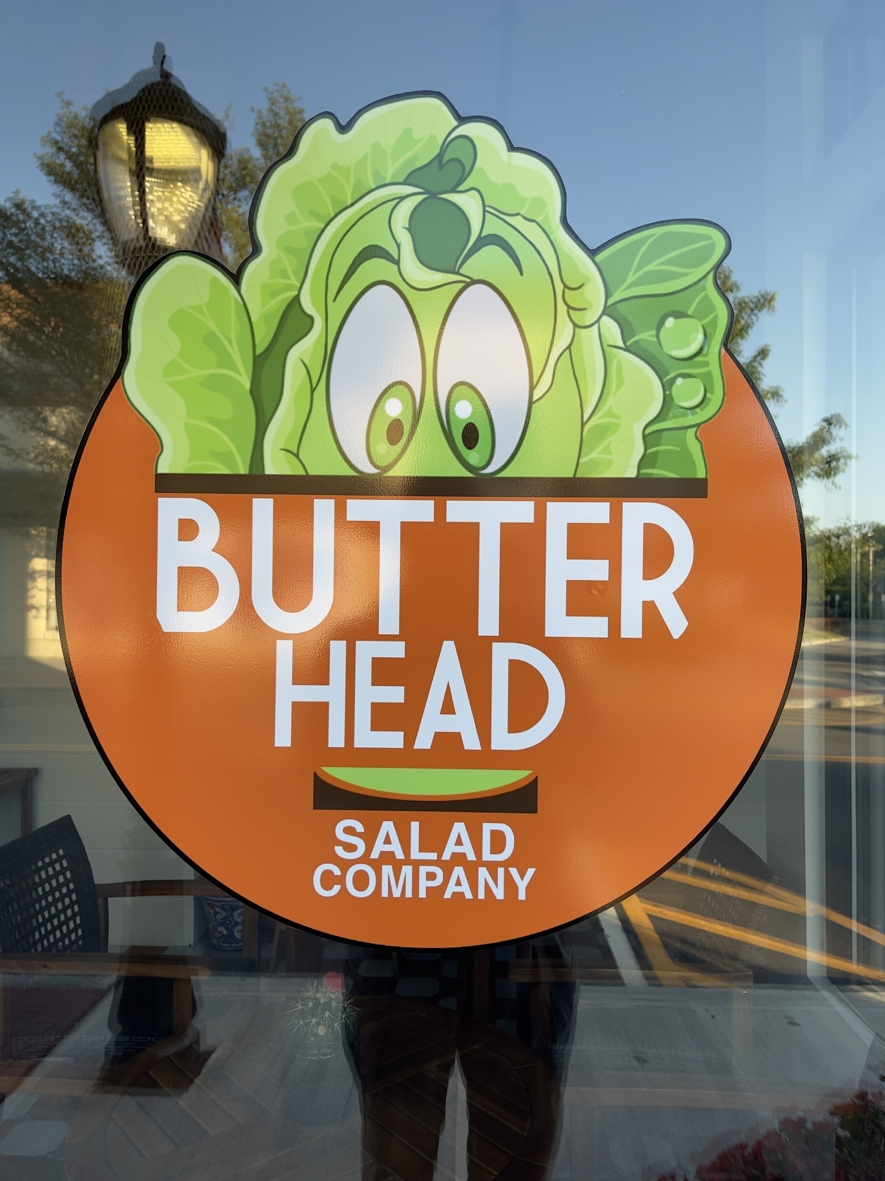 Butter Head Salad Company window graphic.