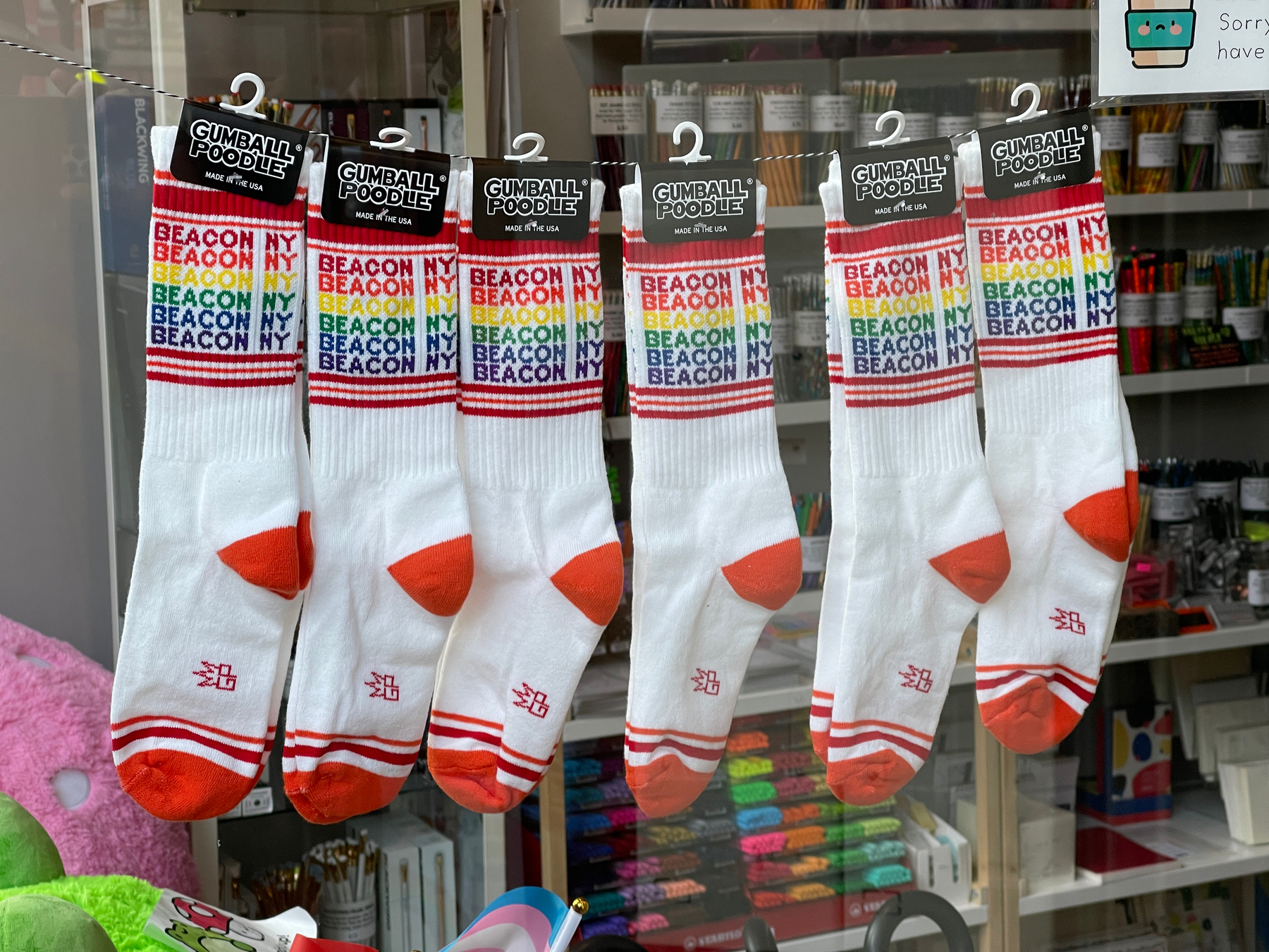 Beacon, NY labeled socks in gay pride colors.