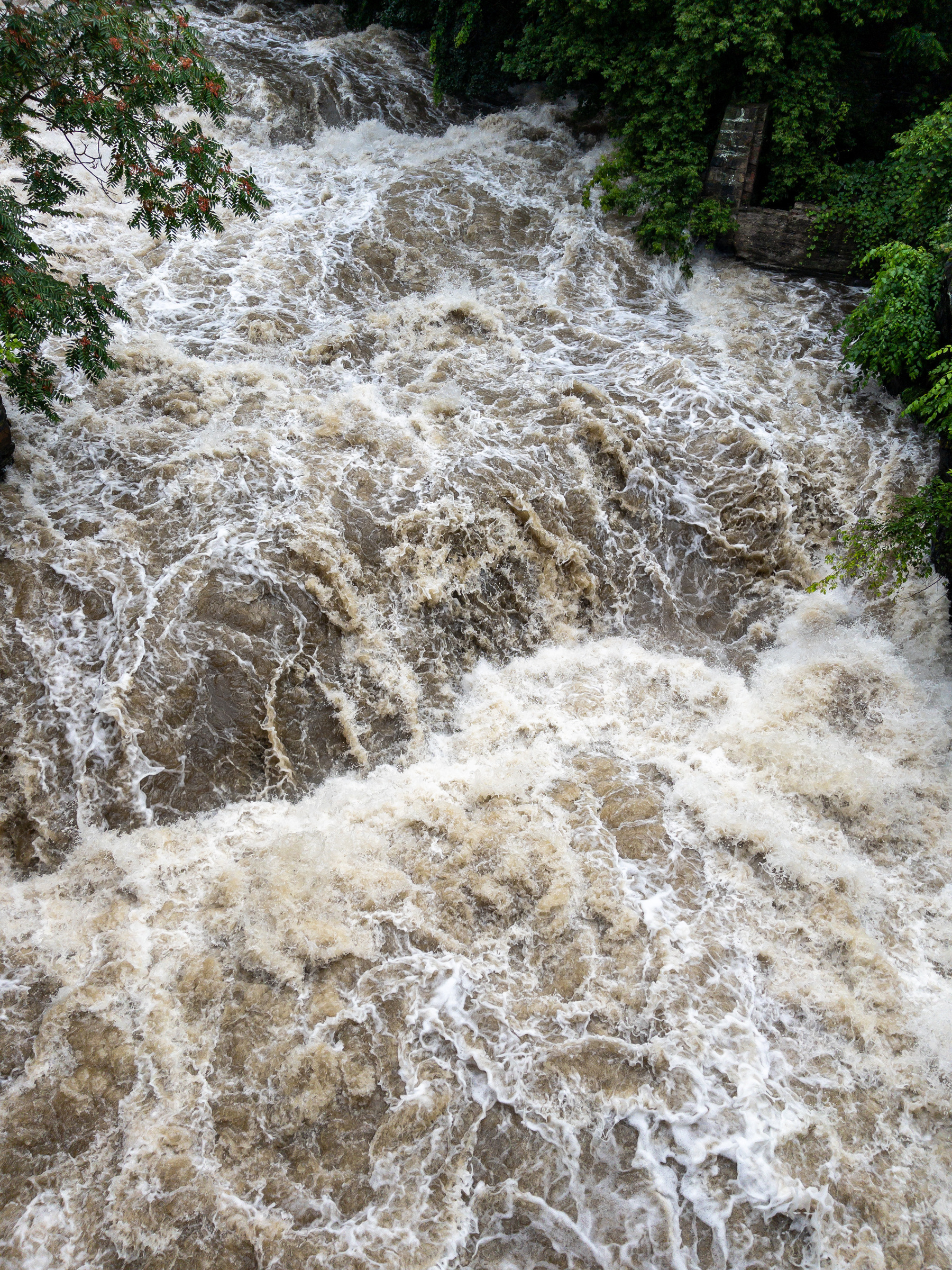 Tumbling, violent rapids in local stream after heavy rainfall.